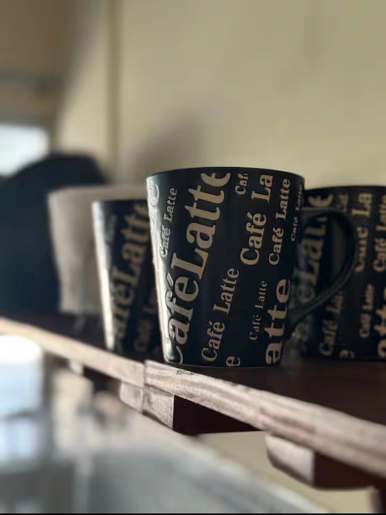 Café Latte Ceramic Mug – Sleek Black with Vibrant Red Interior