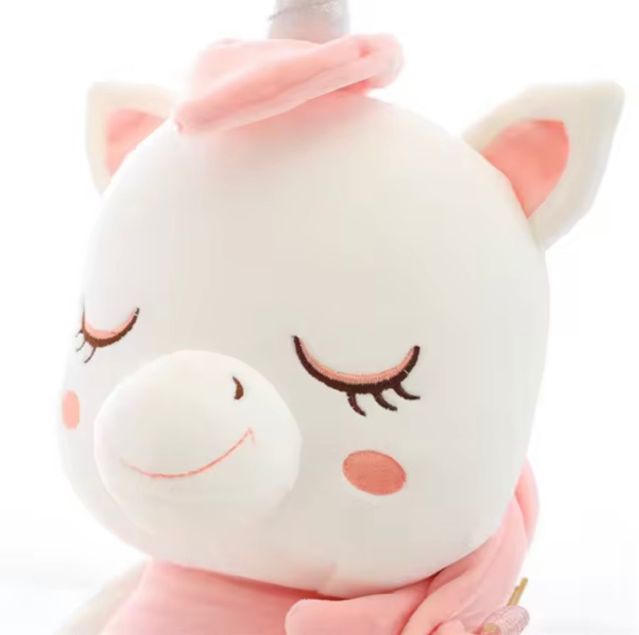 These pink and blue unicorn plush toys are soft and cuddly, perfect for children and unicorn lovers..