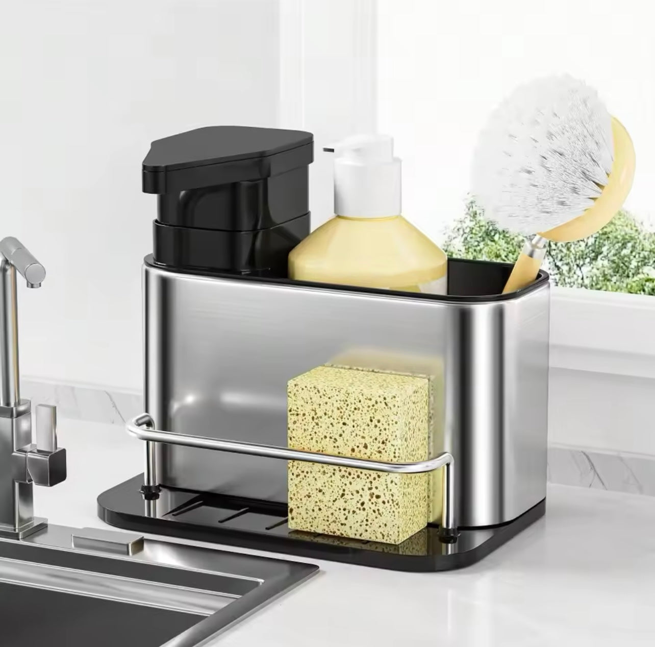 Kitchen Storage Rack Made of Stainless Steel, Featuring a Detergent Dispenser, a Sponge Holder, And a Utensil Rack with a Drainage Tray. It Is Durable, Resistant to Rust, And Ideal for Use by The Kitchen Sink,