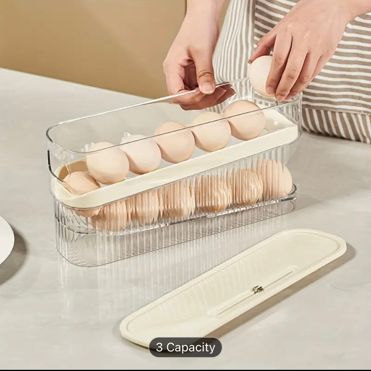 A Large-Capacity Shockproof And Drop-Resistant Automatic Rolling Egg Holder, Suitable for Refrigerator Egg Storage, Easy to Clean, And Designed for Durability.