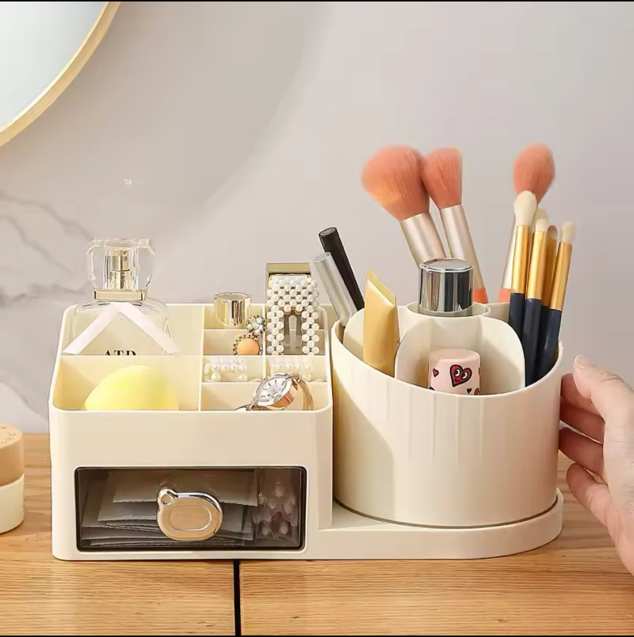 A 360° rotating cosmetic storage box - a multifunctional desktop organizer with multiple compartments, featuring drawers for storing lipsticks, perfumes, makeup brushes, skincare products, and stationery. No power source or batteries required.