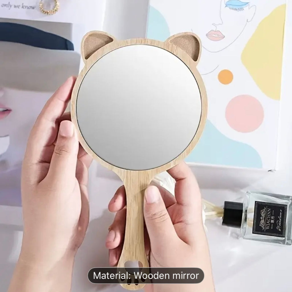 يشمل تصميم شكل مرآة Cat Cat Cat القطط وعناصر الحب ، المليئة بالقلب الجريلي ، باستخدام مقبض هريرة خشبي ، ودقة عالية ، وسعر ميسور التكلفة ، ومناسبة للحمل للمسحة للمكياج
