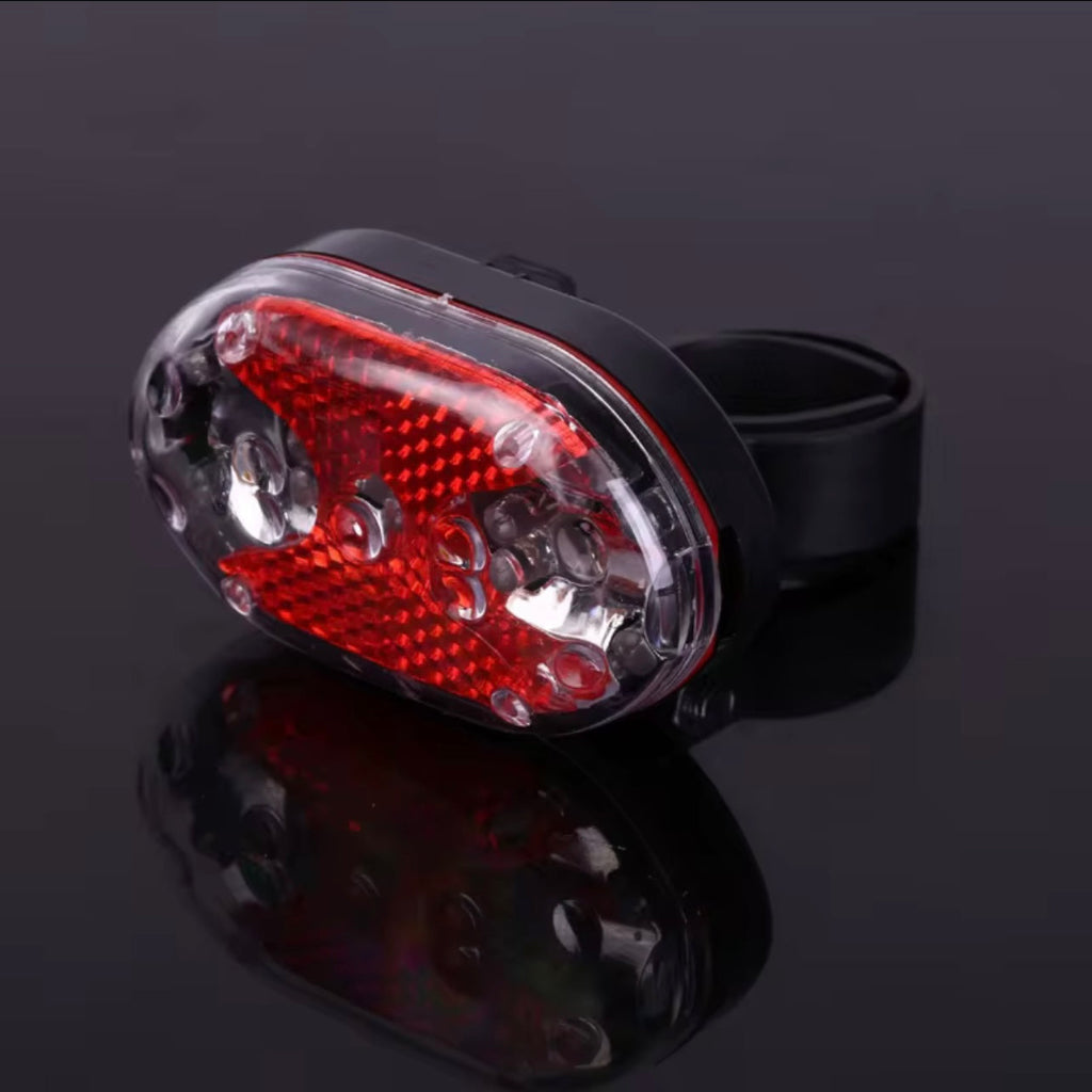 LED Bicycle Front & Rear Light Set Waterproof Stay safe and visible on the road with this high-performance LED Bicycle Light Set. This essential cycling accessory includes a powerful front white headlight and a bright red rear taillight,