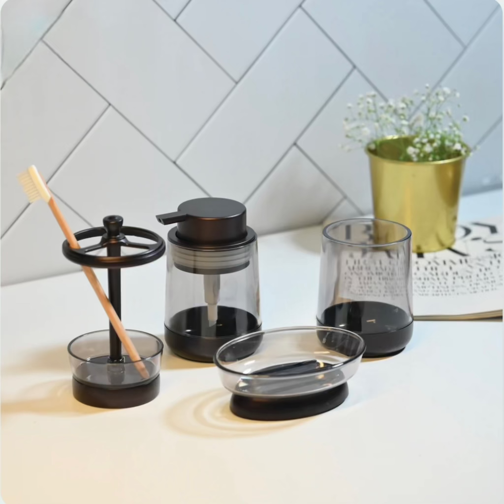 4-in-1 acrylic bathroom organizer set with soap dispenser, toothbrush holder,storage canister, toilet brush, and soap dish.